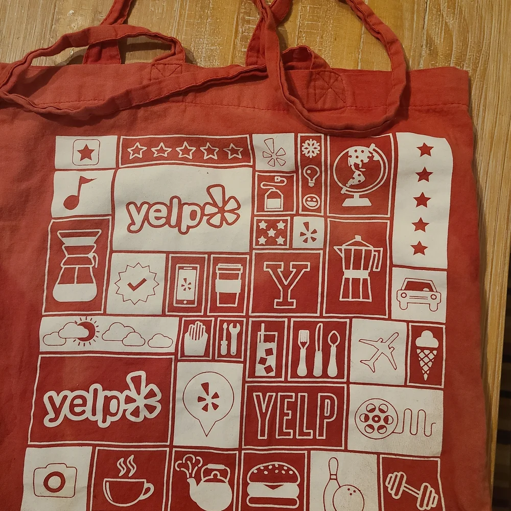 Elite 2014 White Beach Towel with Red and Yellow Icons